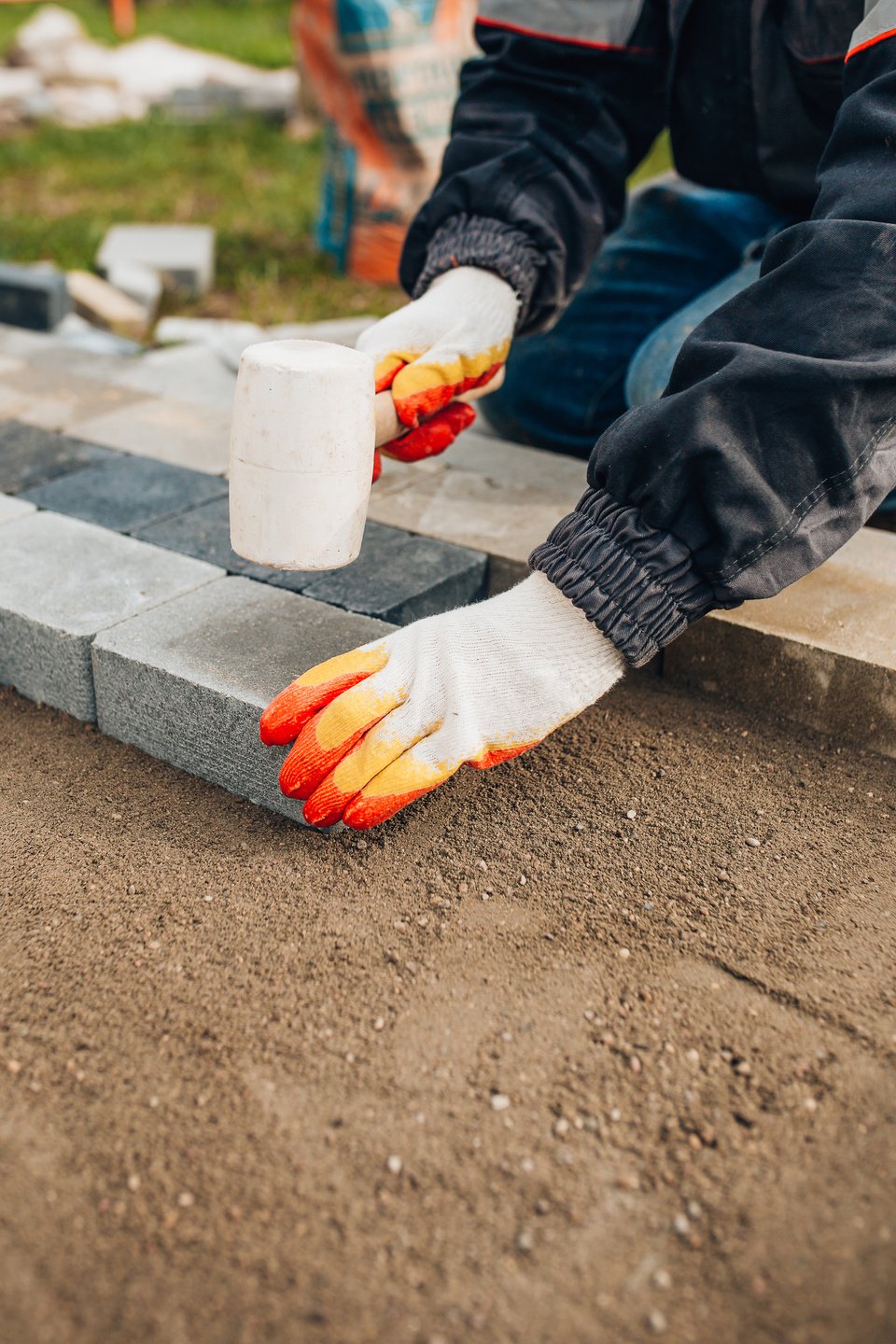 Concrete fabrication and paving stone laying